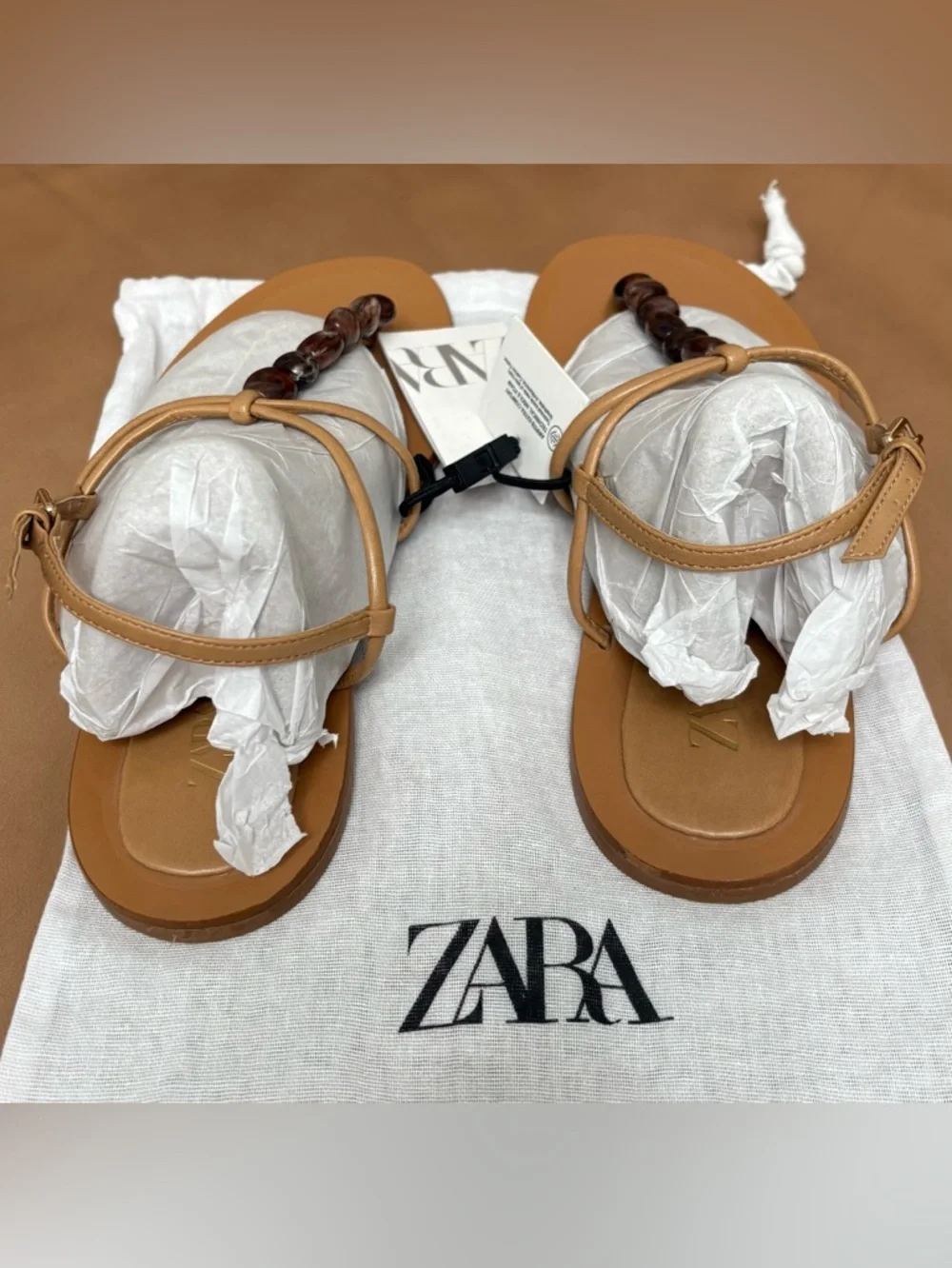 ZARA Tan Leather Beaded T-Strap Sandals
6.5 (37) NWT - Picture 6 of 7